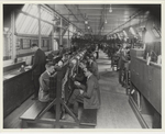 Male students working with textile machinery, 1928
